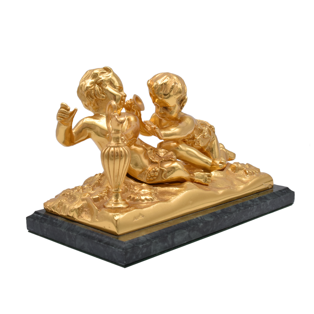 Fermacarte con puttini